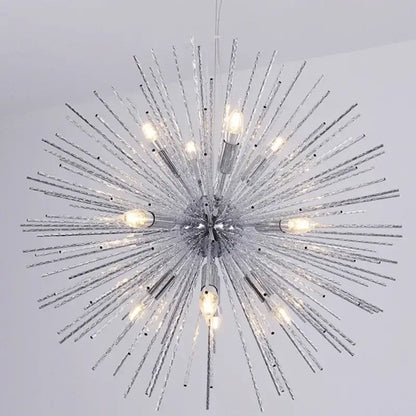Modern golden decorbites geometric starburst chandelier featuring silver spiky design with glowing bulbs and textured glass rods