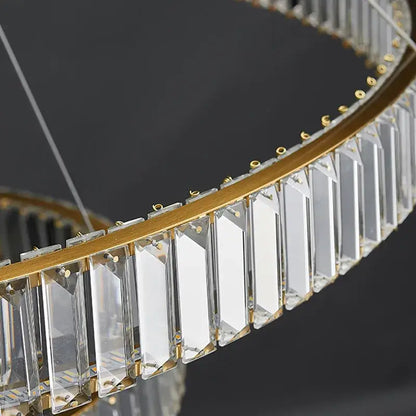 A modern golden double ring decorbites crystal led ceiling chandelier with clear rectangular crystal prisms for dining room
