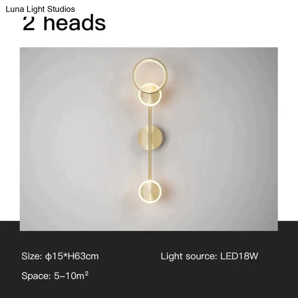 Modern golden geometric led wall lamp with two circular led light heads and vertical rod for living room wall lamp use