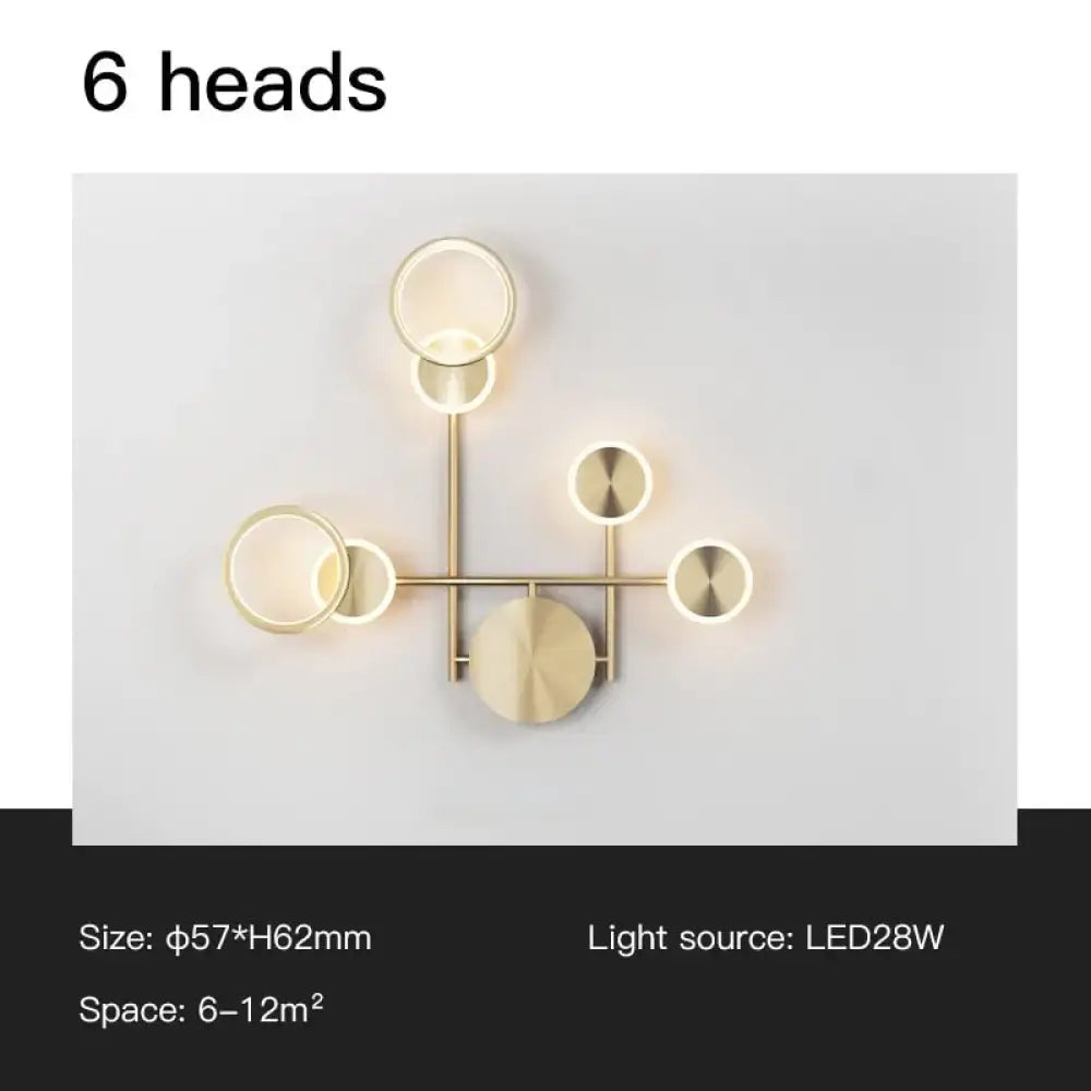 Modern gold-toned geometric led wall lamp with six circular light heads for living room wall lamp lighting
