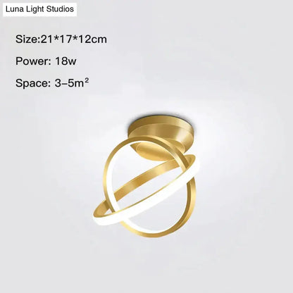 Modern golden geometric led wall lamp with intertwined circular rings in a sleek design for living room wall lamp