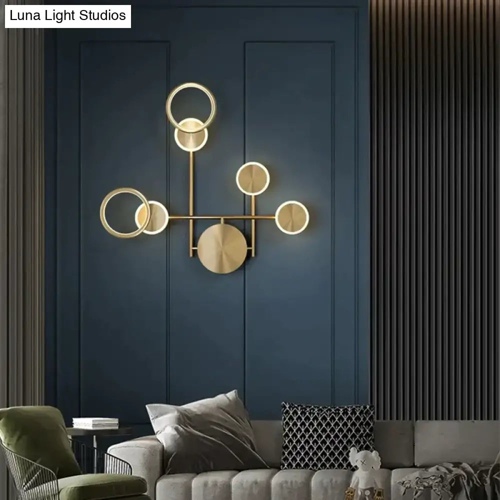 Modern golden geometric led wall lamp with asymmetrical circular light fixtures for living room decor