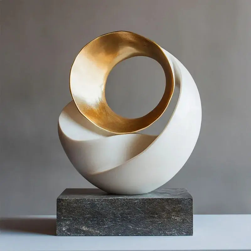 Abstract sculpture with polished gold and matte white flowing form modern golden geometric resin decor for home decorbites home decor
