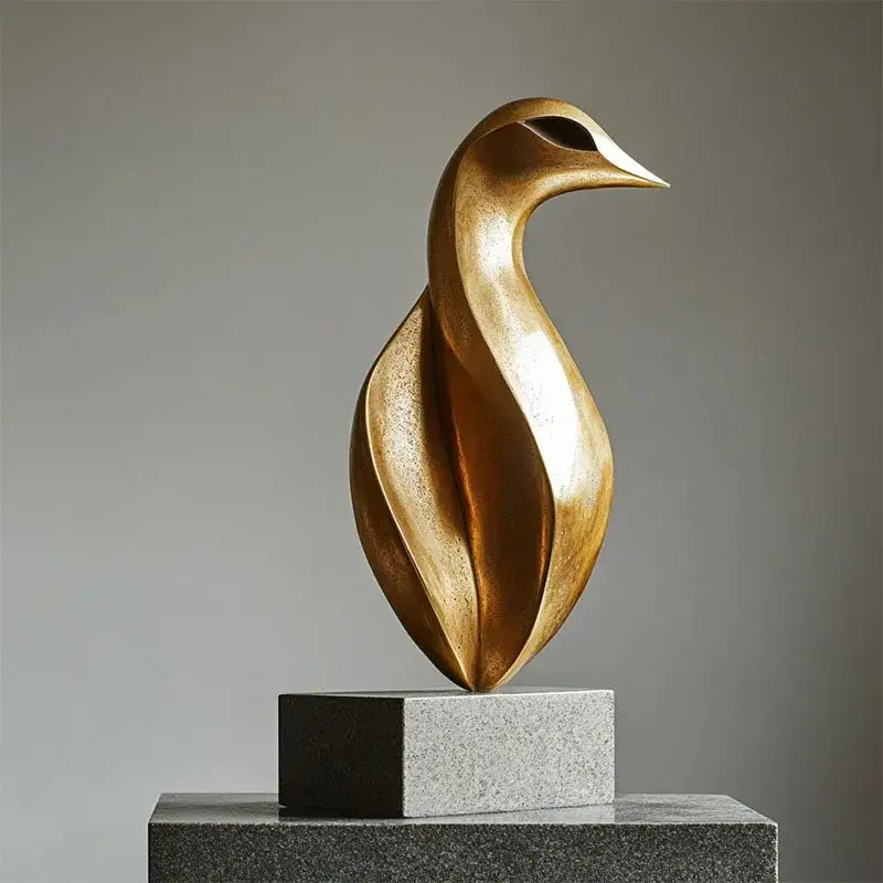 Modern golden geometric resin bird sculpture with sleek curves and polished finish for home decor and decorbites golden geometric collection