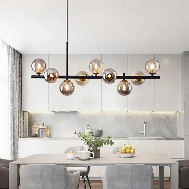 Modern black metal decorbites golden glass ball chandelier with amber-tinted glass globes for dining room lighting