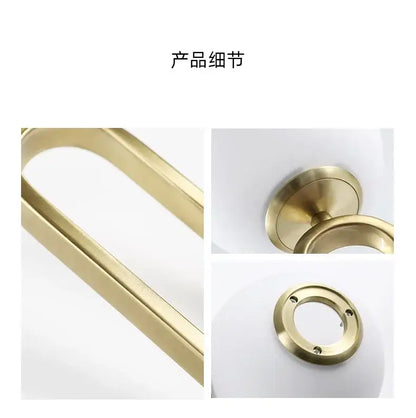Modern golden glass ball pendant light with a sleek gold-toned metal door handle and brushed finish decorbites golden glass decor