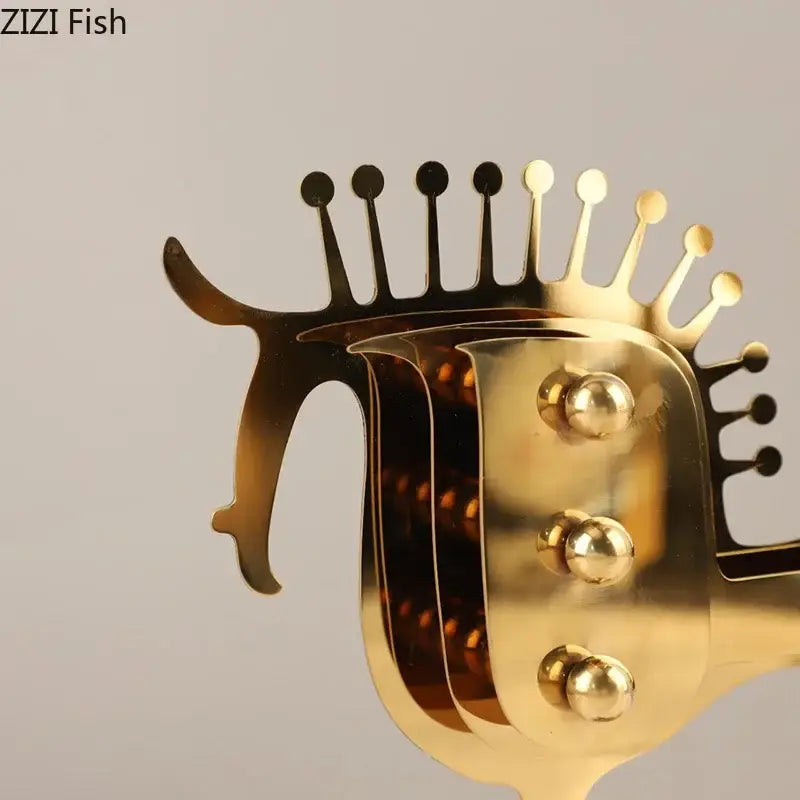Modern golden horse metal sculpture with crown-like mane and three spherical accents for living room decorbites golden horse decor