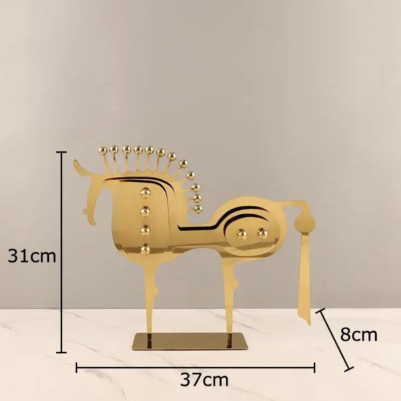 Gold-colored metallic horse sculpture with decorative spheres for modern living room desk decorbites golden horse decor