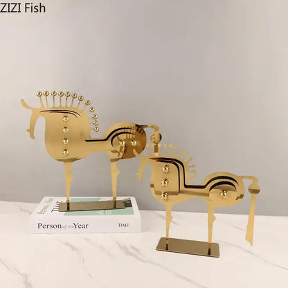 Modern golden horse metal sculpture with decorative spherical accents for living room desk decor by decorbites golden horse