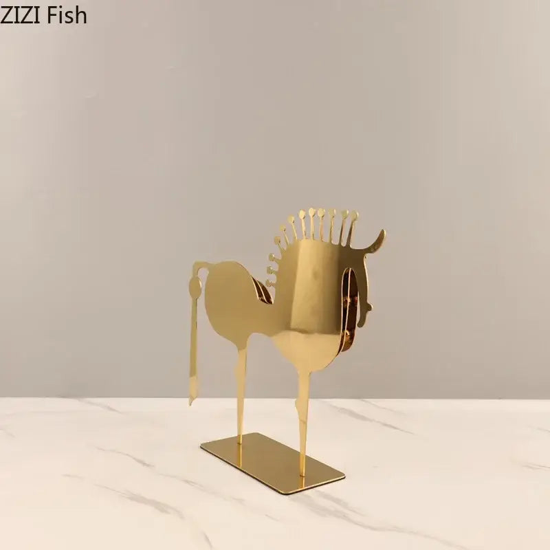 Gold-colored metallic golden horse sculpture with minimalist design and cut-out details for modern living room decorbites golden horse decor