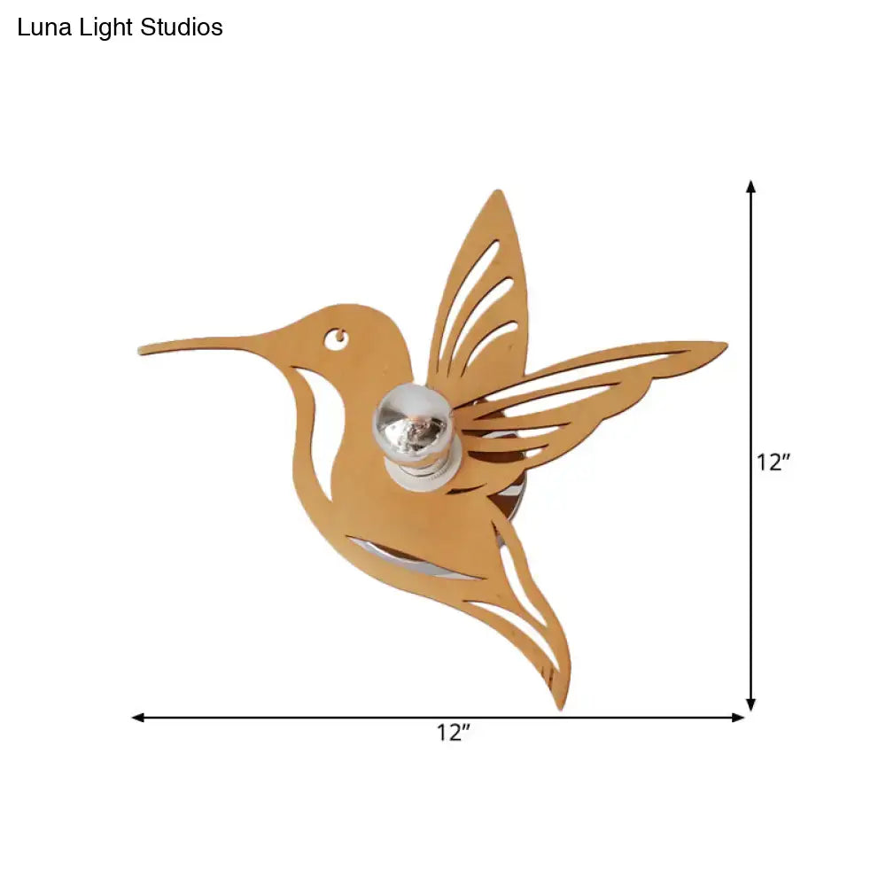 Modern golden hummingbird bedside lamp wall sconce with polished chrome inch fixture and decorative bulb nestled in body