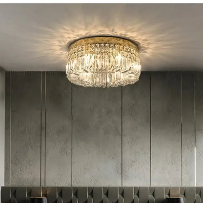 Modern golden led crystal ceiling lamp with gold-toned frame and clear glass prisms for living room decorbites golden led