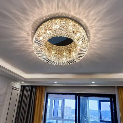 Modern golden led crystal ceiling lamp with gold-toned frame and radiating glass prisms for living room decorbites ceiling lamp