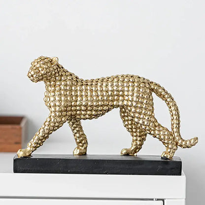 Modern golden leopard resin figurine with textured beaded surface on black base for living room decorbites golden leopard decor