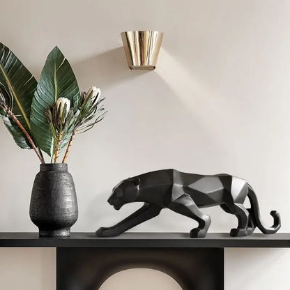 Black geometric panther figurine with metallic silver accents complementing decorbites golden leopard resin sculpture decor