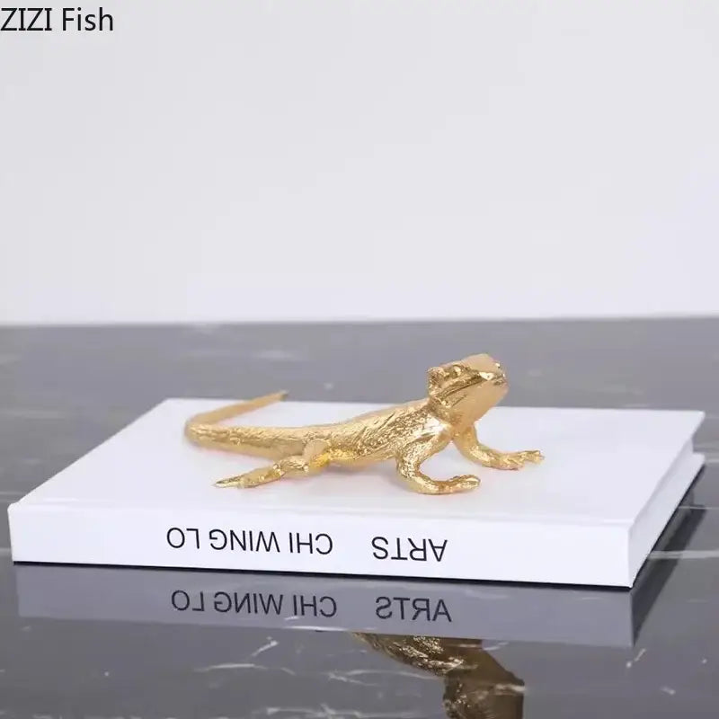 Modern golden lizard sculpture with detailed scales and textured surface metal desk ornament for living room decor