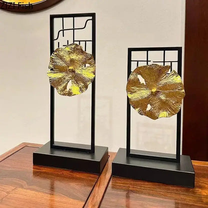Modern golden lotus leaf framed sculpture featuring textured golden lotus leaves on black metal lattice for living room decor