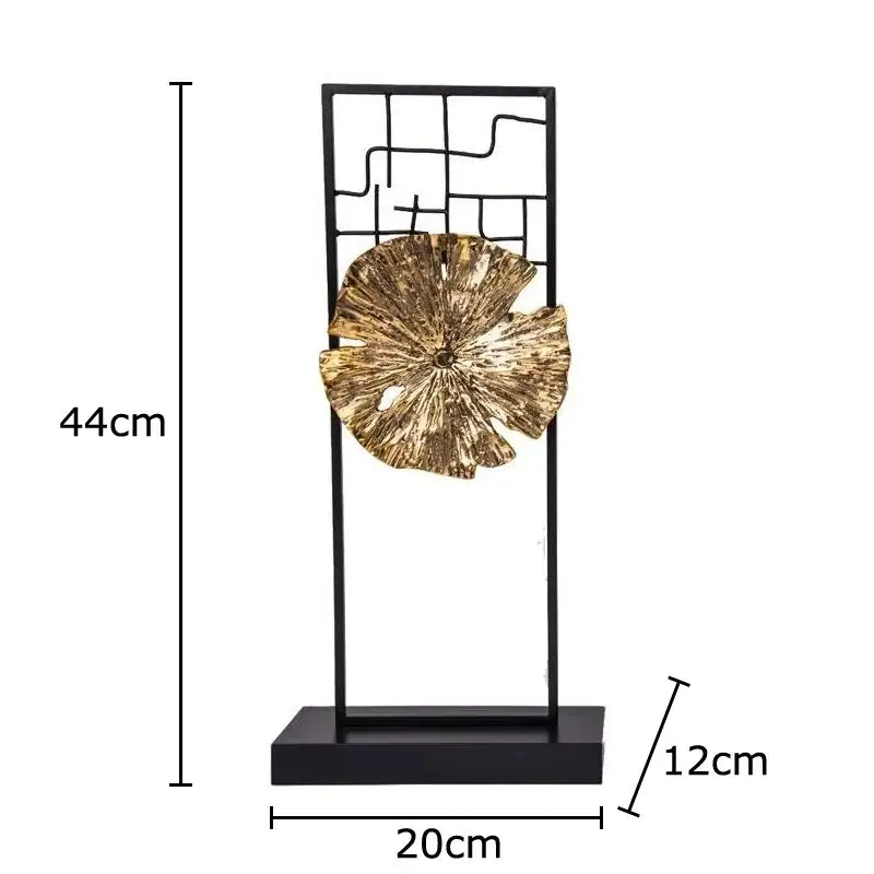 Modern golden lotus leaf framed sculpture featuring a textured golden lotus leaf on a black geometric metal frame for living room decor