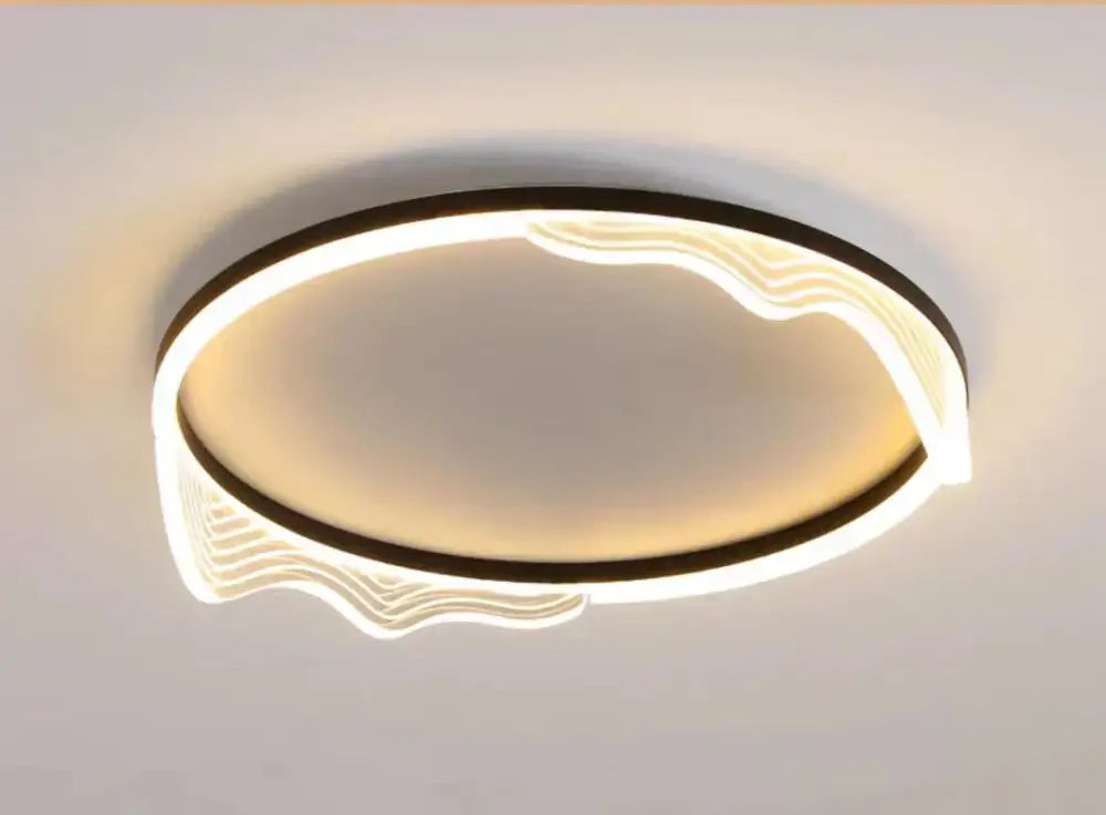 Modern golden lustre ceiling lamp with sleek black frame and warm led light perfect for bedroom decorbites golden lustre