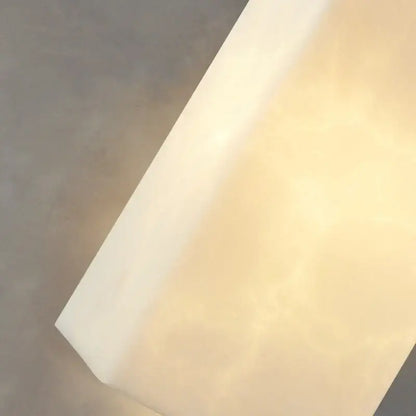 A sleek off-white luxury marble pendant lamp with smooth matte finish and softly diffused light for dining room decorbites golden luxury