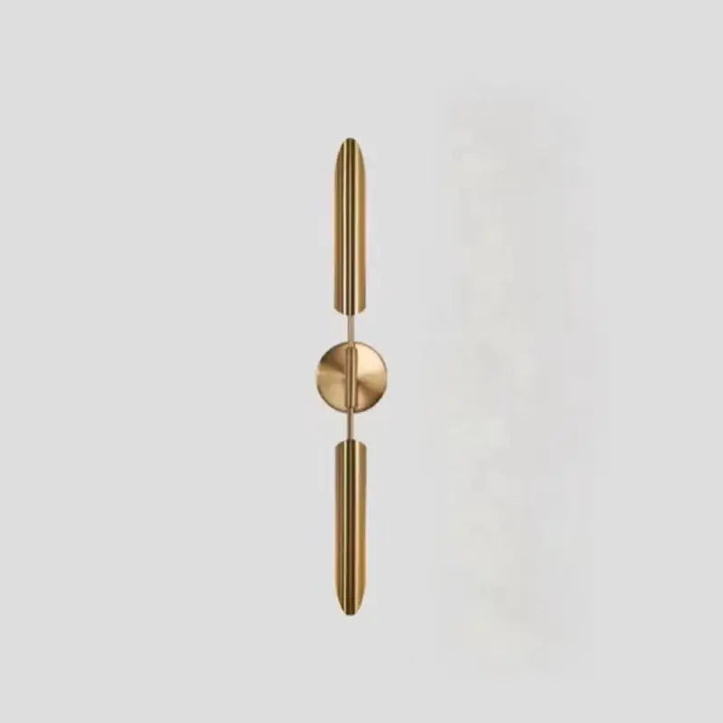 Modern golden metal led wall lamps with gold-toned minimalist design featuring sleek vertical arms for bedroom decorbites decor