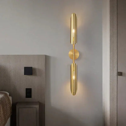 Modern golden metal led wall lamps wall sconce with two cylindrical shades and circular base for bedroom and living room decorbites golden metal