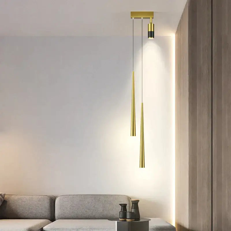 Modern decorbites golden pendant chandelier with sleek cylindrical gold-toned shades for living room lighting