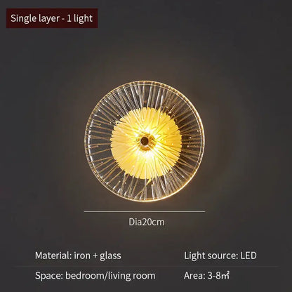 Modern golden radial crystal wall lamp with clear glass and iron construction emits warm yellow light for living room decorbites crystal wall
