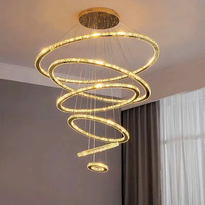 Modern golden spiral crystal stair chandelier with crystal-encrusted rings and warm led lighting for living rooms
