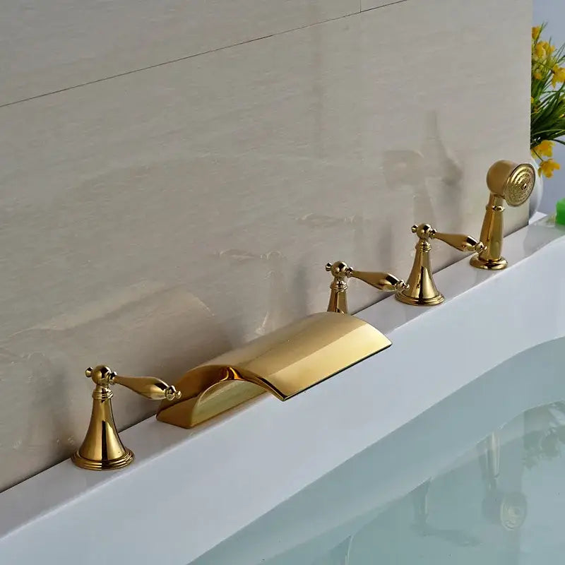 Modern golden widespread brass bathtub faucet with sleek waterfall spout and two handles for bathroom use