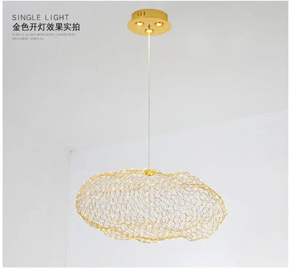 Gold-colored pendant light with mesh wireframe and three embedded lights in ceiling mount decorbites cloud pendant