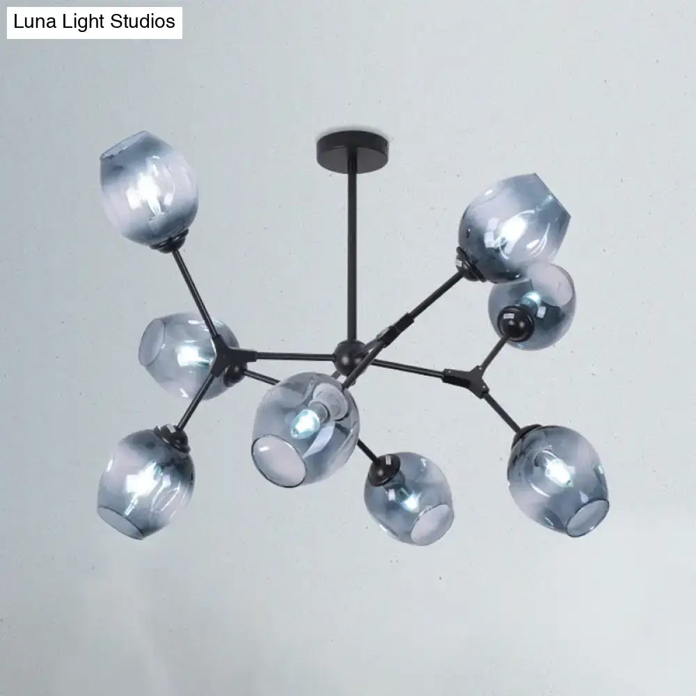 Modern black metal chandelier with eight translucent gradient blue glass globe shades for living room lighting
