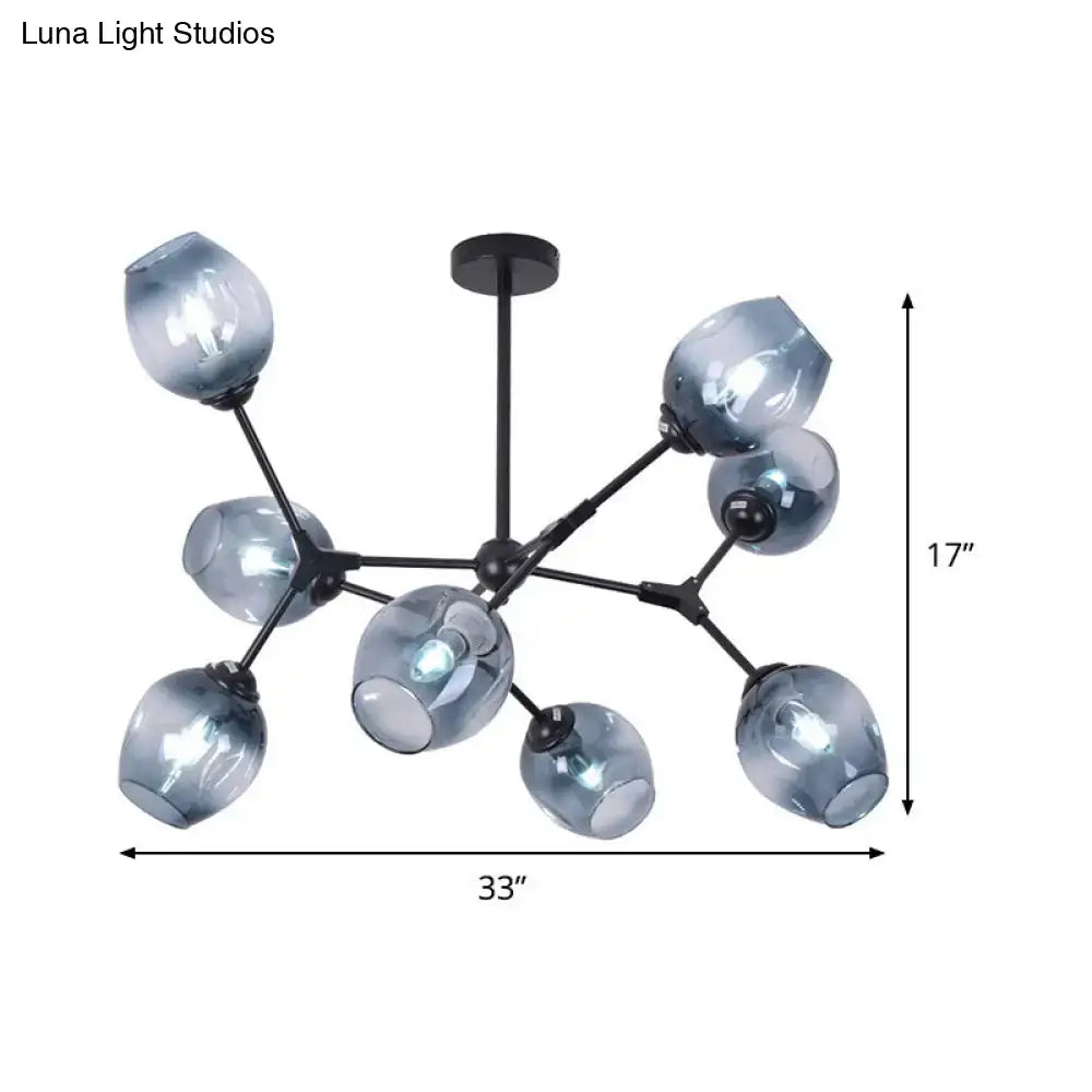 Modern chandelier with eight frosted gradient blue glass globes on a black metal frame for living room lighting