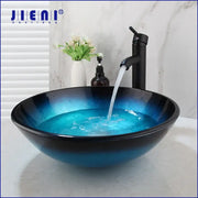Modern gradient blue glass vessel sink set featuring a sleek glossy finish and black rim for bathroom decorbites blue glass sink