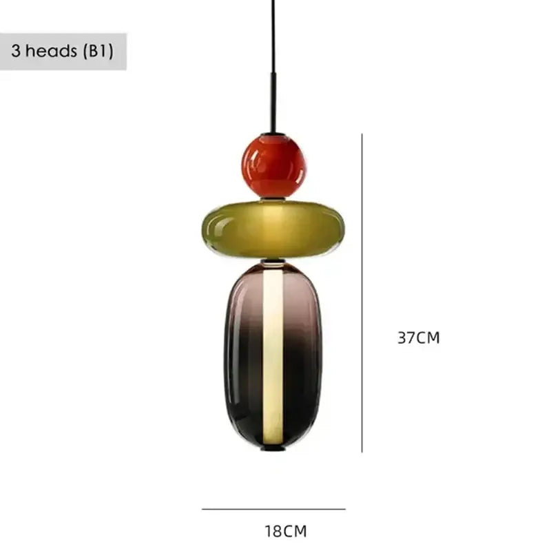 Modern gradient glass pendant light featuring three colorful stacked spherical and oval heads for dining room use