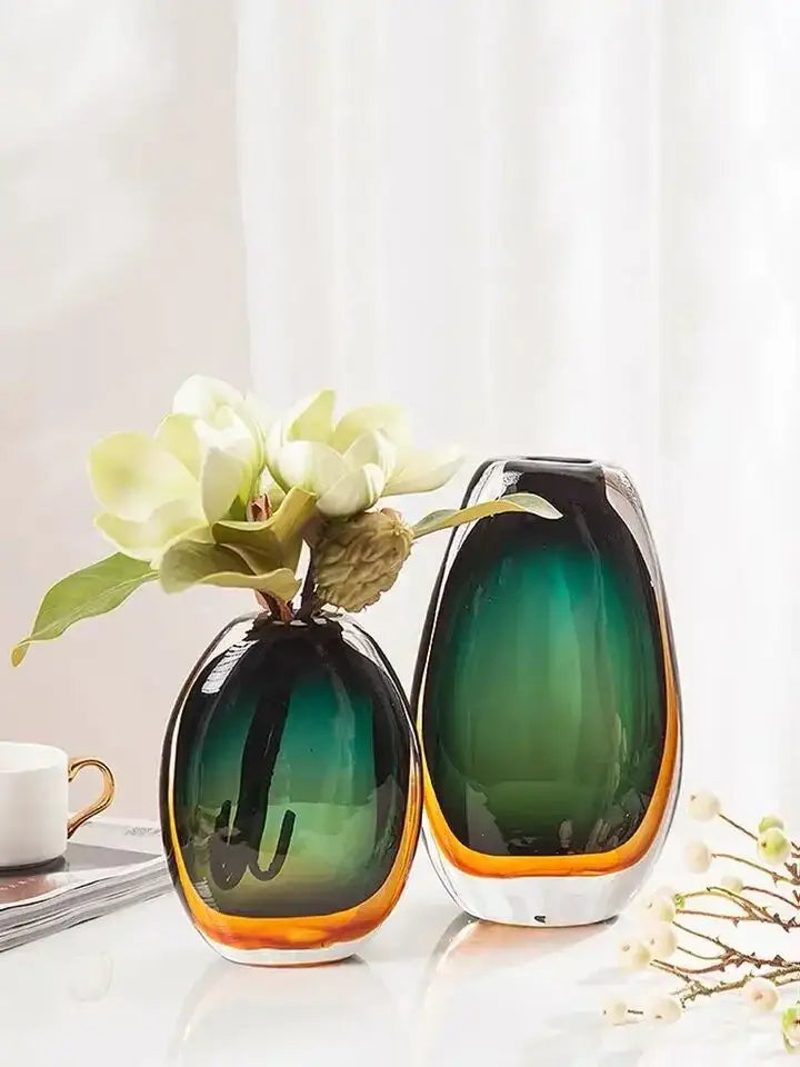 Two elegant oval-shaped decorbites gradient glass vases in green to amber hues for modern living room decor