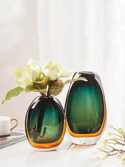 Two elegant oval-shaped decorbites gradient glass vases in green to amber hues for modern living room decor