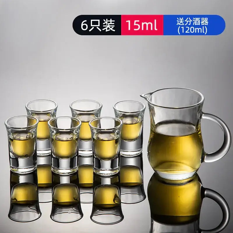 Set of six clear glass spirit brandy cups each holding 15ml filled with golden liquid for modern dining use