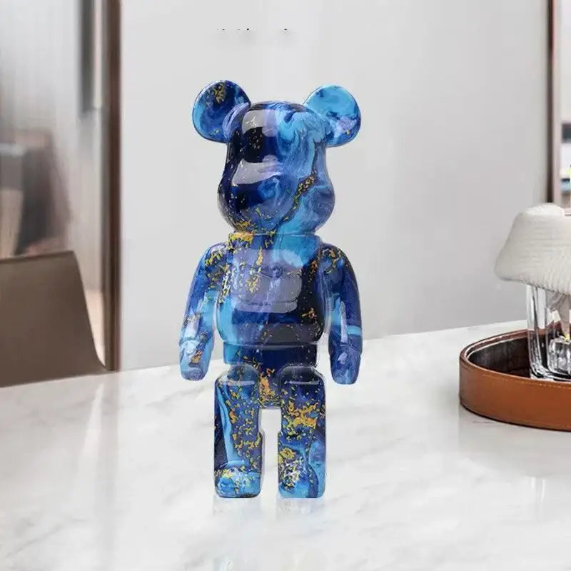 Glossy blue and gold marbled decorbites graffiti bear 27cm figurine with translucent resin finish used as living room money jar
