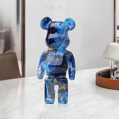 Glossy blue and gold marbled decorbites graffiti bear 27cm figurine with translucent resin finish used as living room money jar