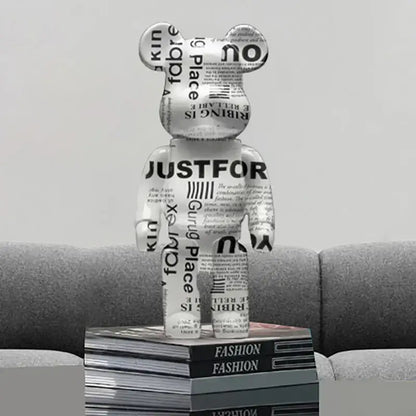 Modern graffiti bear 27cm figurine in white with black newspaper print design for living room decorbites graffiti bear money jar