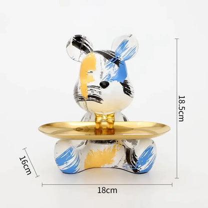 Modern graffiti bear figurine with glossy blue yellow black brushstroke design holding golden tray for living room decor