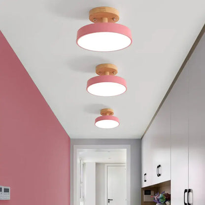 Modern gray acrylic wood led ceiling light with pink circular shade and wooden base by decorbites for bedroom decor