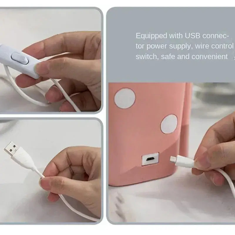 Pink polka-dotted portable usb power bank with white accents complements modern gray and gold decorbites bubble girl statue decor