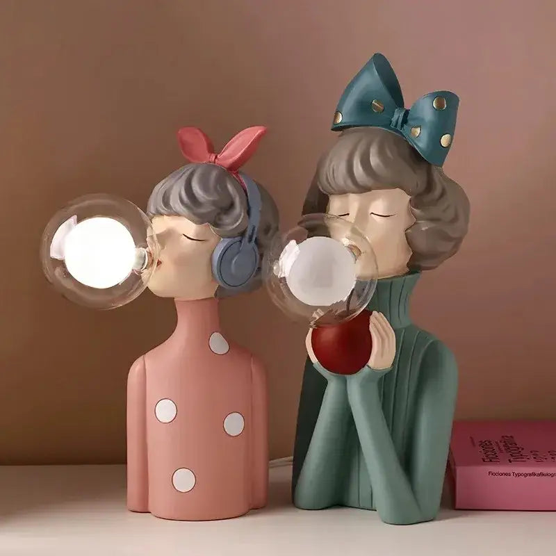 Modern gray and gold decorbites bubble girl statue night light featuring pastel pink and teal resin girl statue ornament