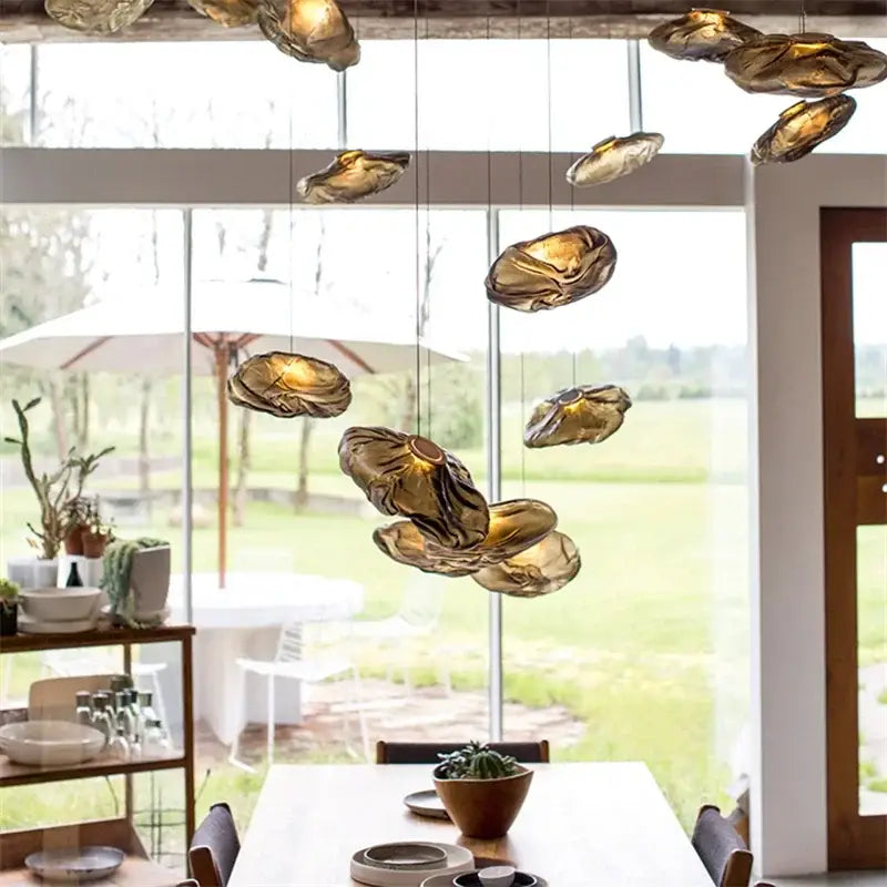 Modern gray cloud glass pendant lights feature amber translucent shell-like decorbites cloud glass pendant fixtures