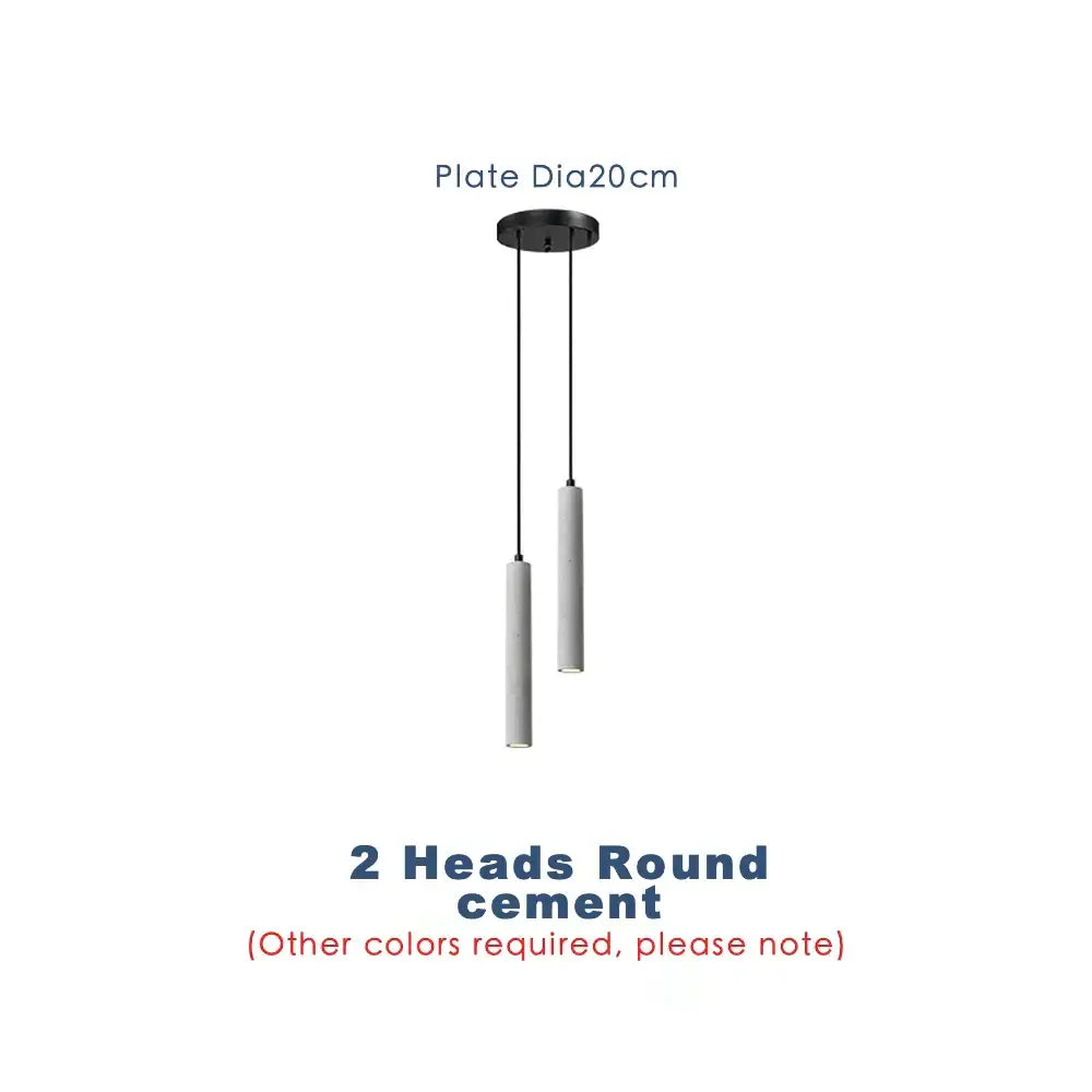 Modern gray concrete tube pendant light with two cylindrical heads suspended from a black plate for dining room decorbites concrete tube pendant