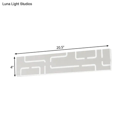 Modern gray geometric led wall sconce with warm white light and direct wired electric installation for bedroom use