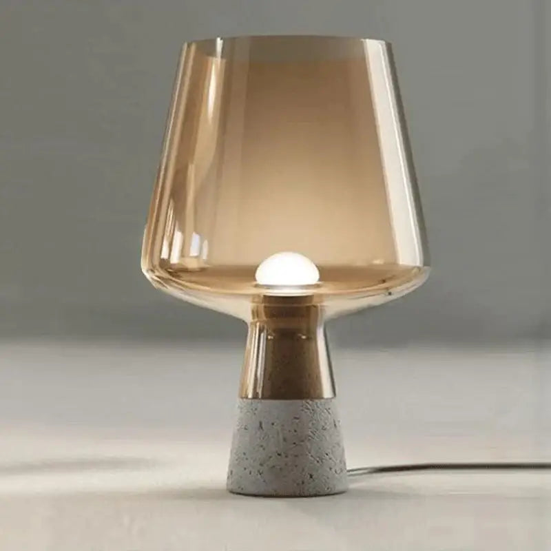 Modern gray glass and concrete table lamp with leimu amber glass shade and metallic gold-toned stem for bedroom decorbites leimu amber