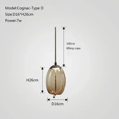 Modern gray glass knot pendant chandelier light featuring a cognac amber glass globe and metallic finish for dining room